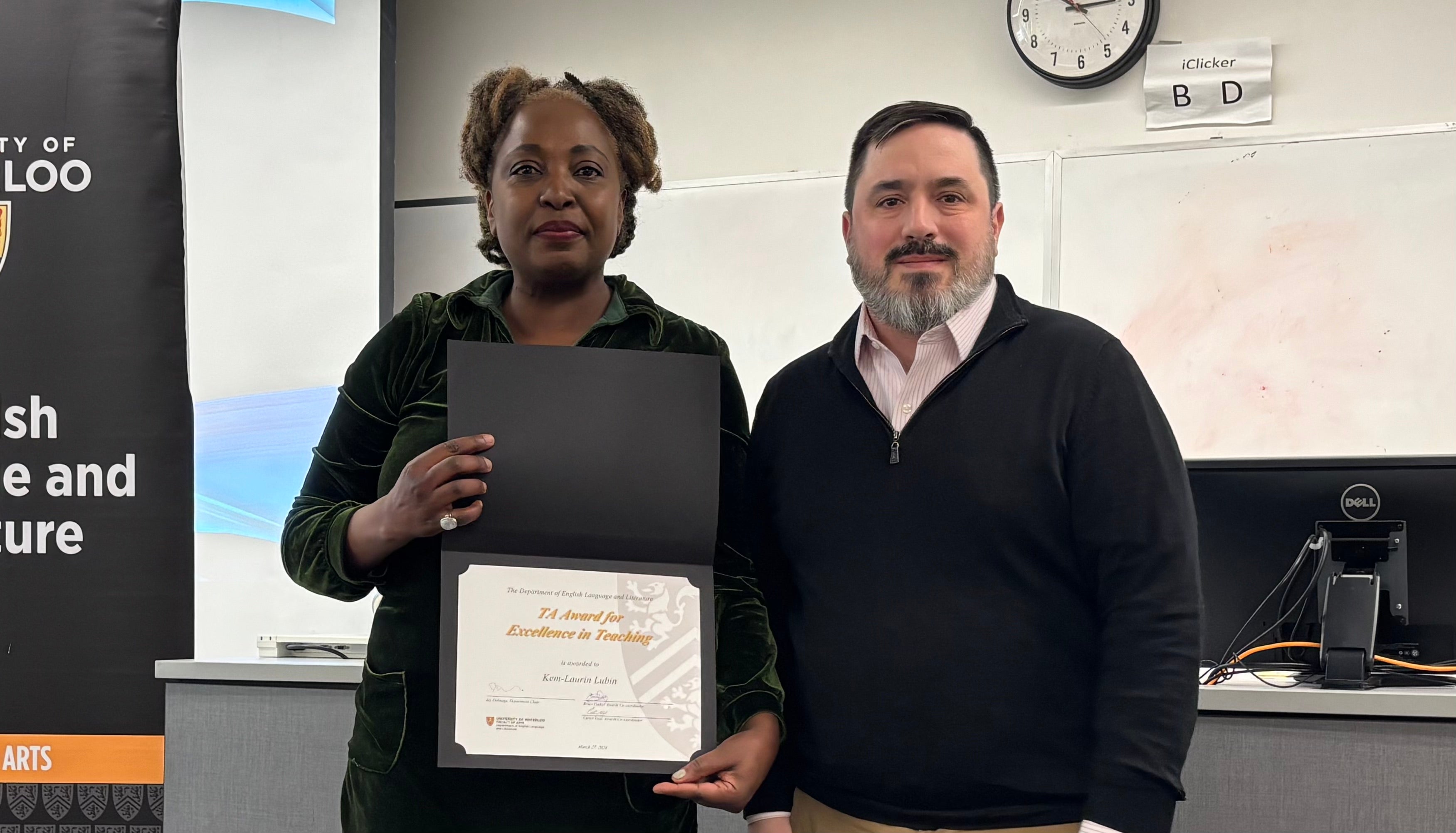 Dr. Carter Neal presents Kem-Laurin Lubin with the TA Award for Excellence in Teaching.