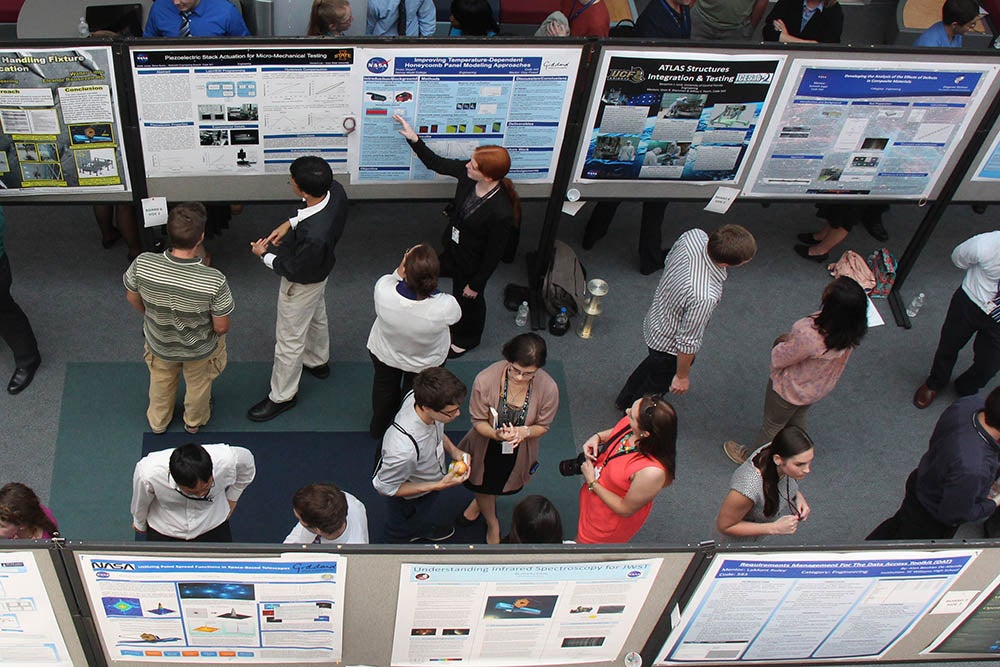 Multiple conference poster presentations.