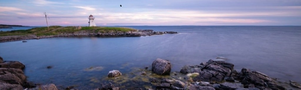 Ocean and lighthouse pictures with rocks and land