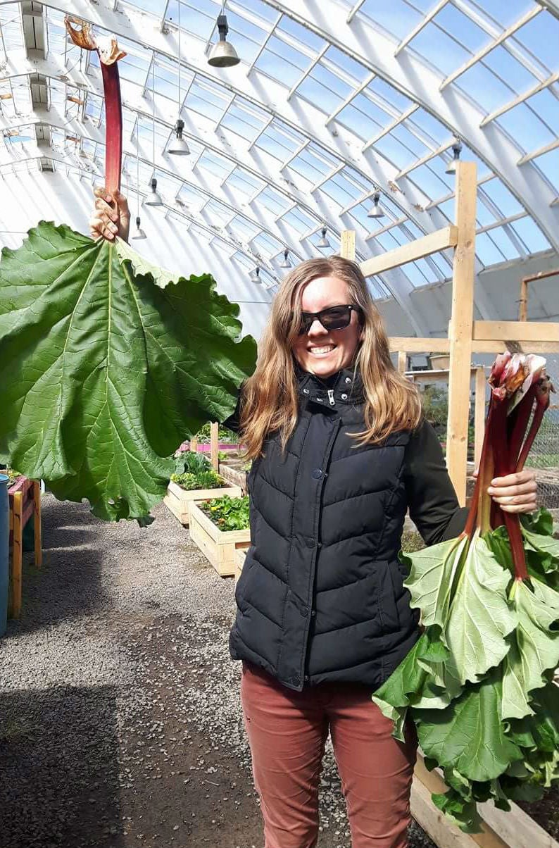 Emily holding rhubarb