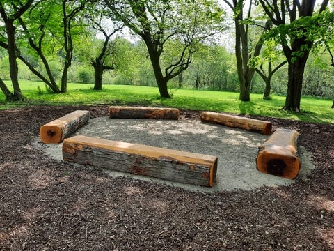Five log benches were installed that can seat up to 25 people. 