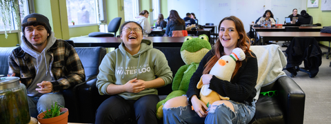 Students laughing inside the ESS lounge in EV1.