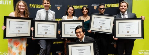 Students posing with their faculty awards 