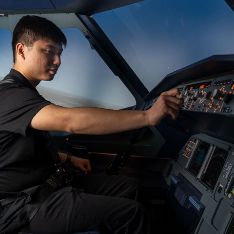 Aviation student in a flight simulator
