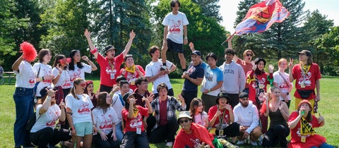 Large group of students posing at an environment orientation event