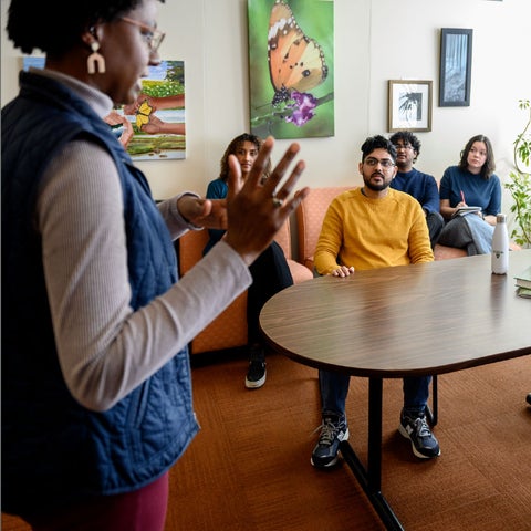Environment students listening to a fellow student presenting