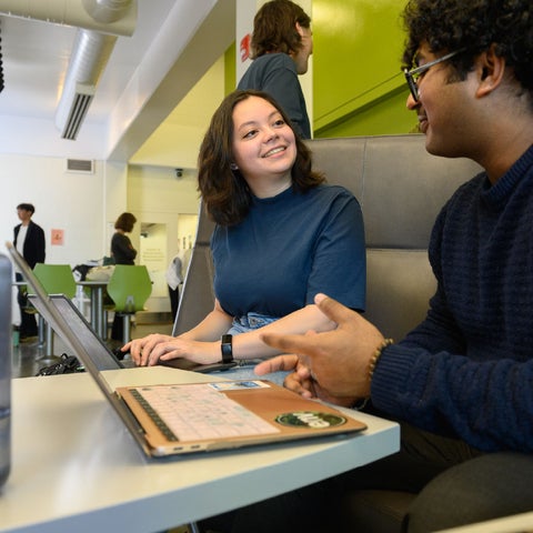 Environment students talking in a student lounge