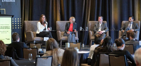 Photo of panelists on stage