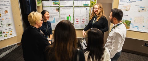 Students at a research poster session