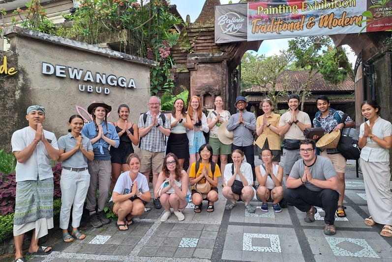 Group of students and professor. 