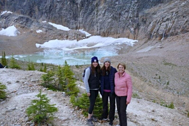 Three women near glacial lake 