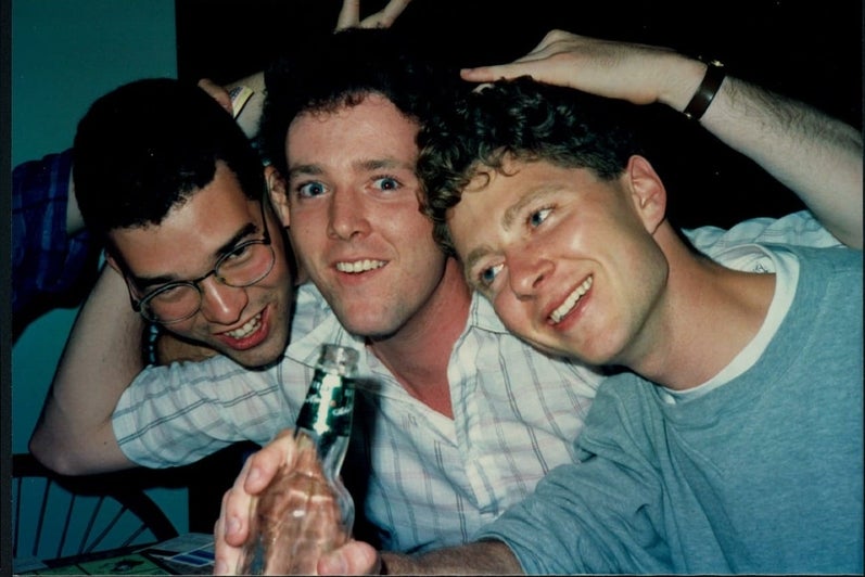 Three planning alumni having fun at a party (~1990)