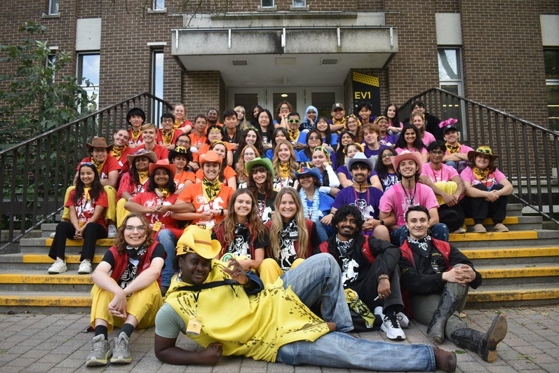Orientation leaders on Environment building steps.