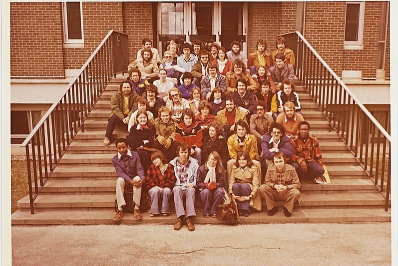 Planning class of 1977 on Environment 1 stairs