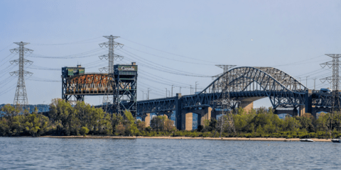 Lift bridge in up position for a ship crossing through the Burlington Canal