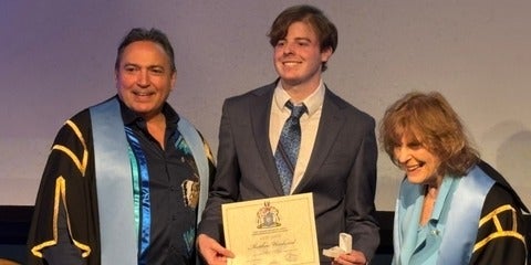 Matthew Woodward receiving his Royal Canadian Geographical Society fellowship