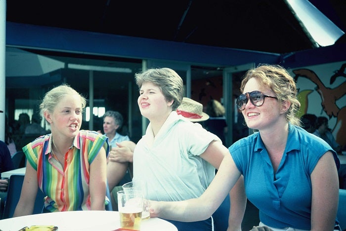 Maureen (Dunningan) Black, Louise Ann (Smyth) Riddell, and Lee Anne Doyle sitting at a table together.
