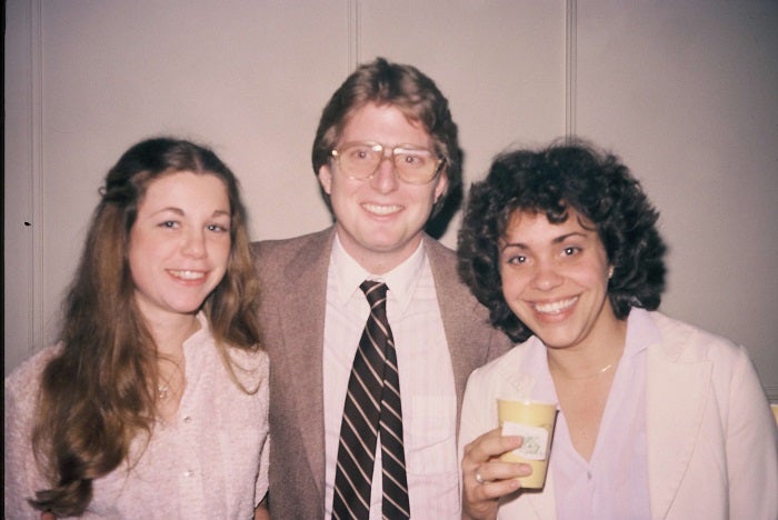 Marion Garrow, Mark Reeve and their friend smiling for a photo.