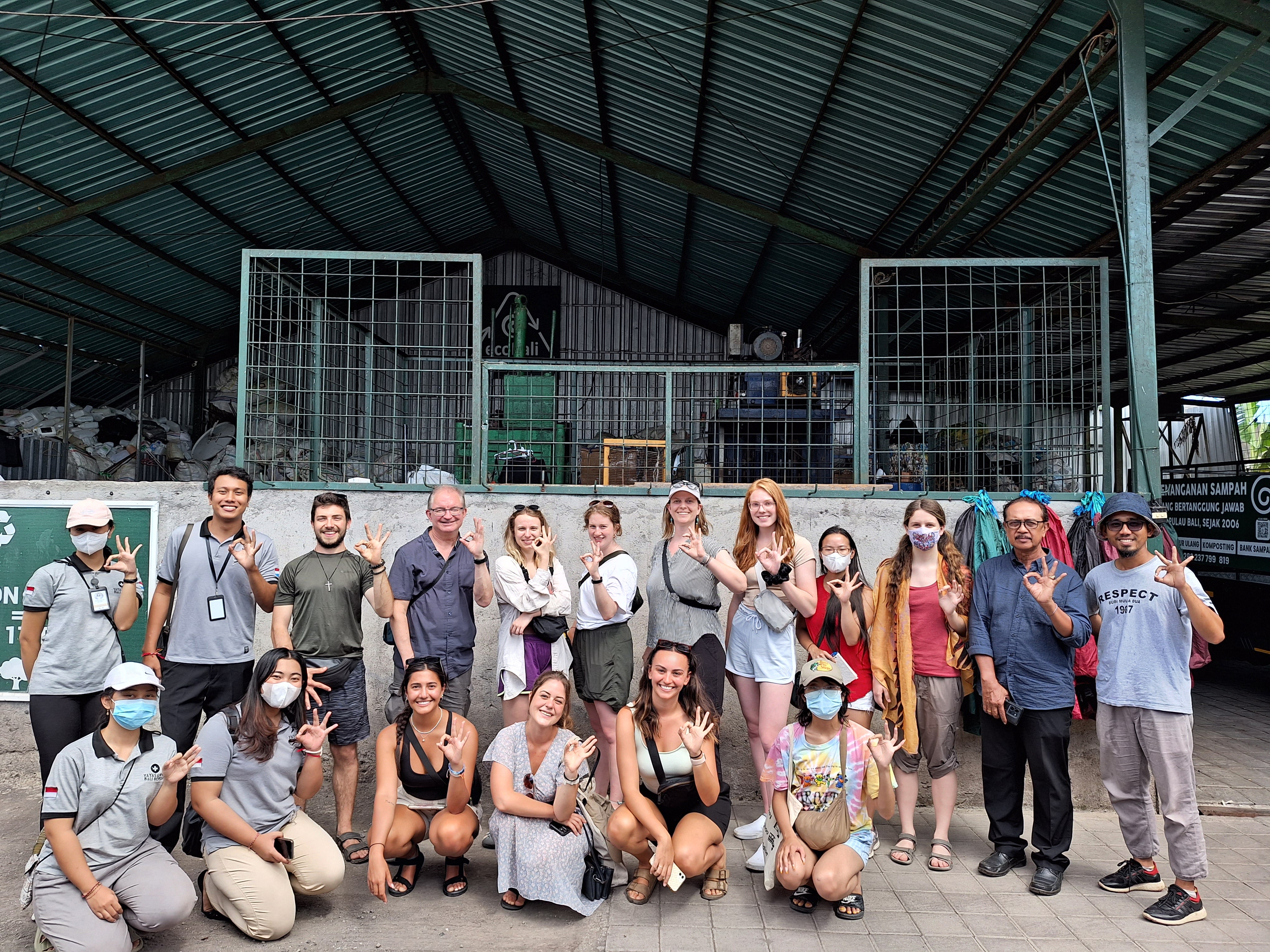 Group of students and professor. 