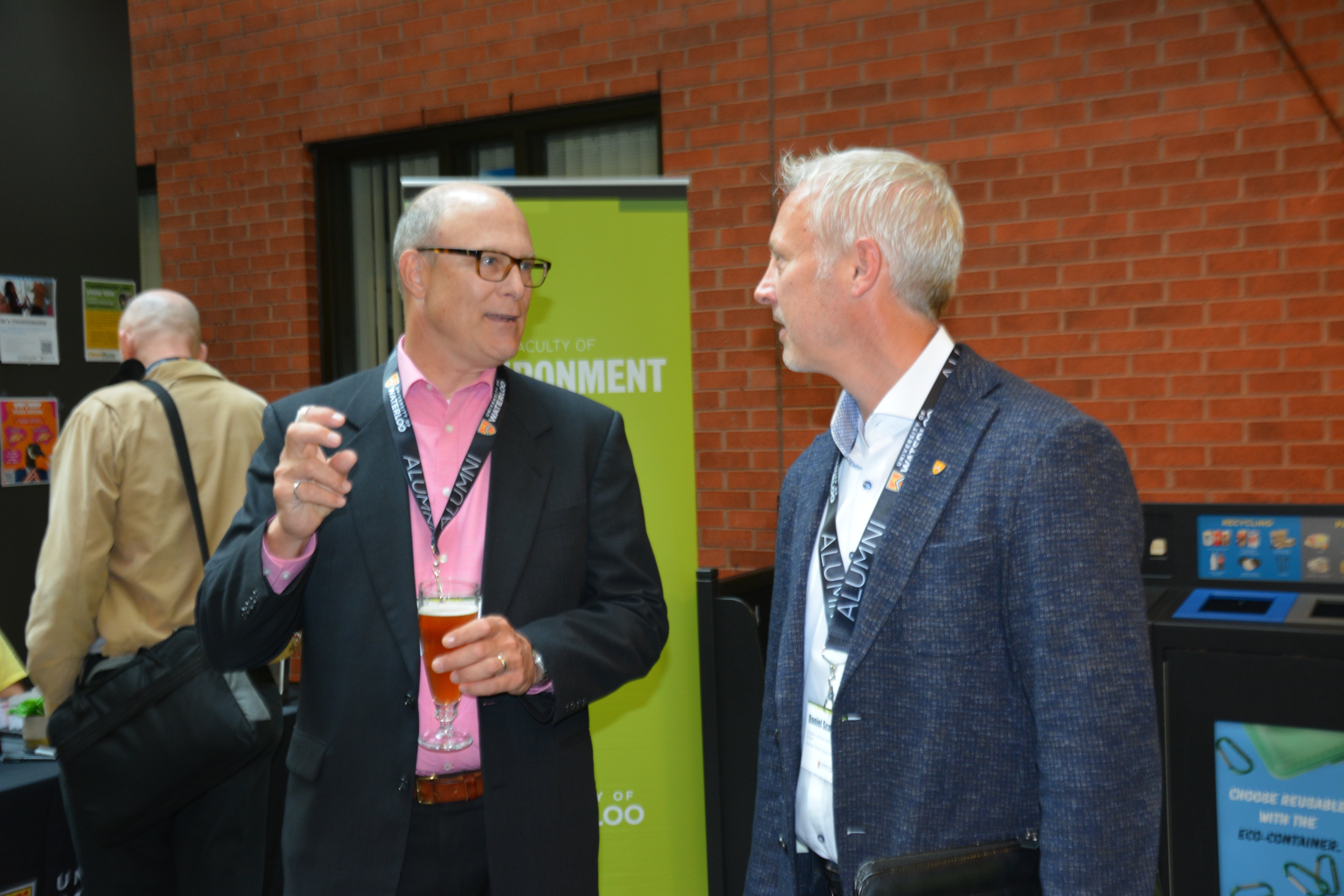 two men in suits talking