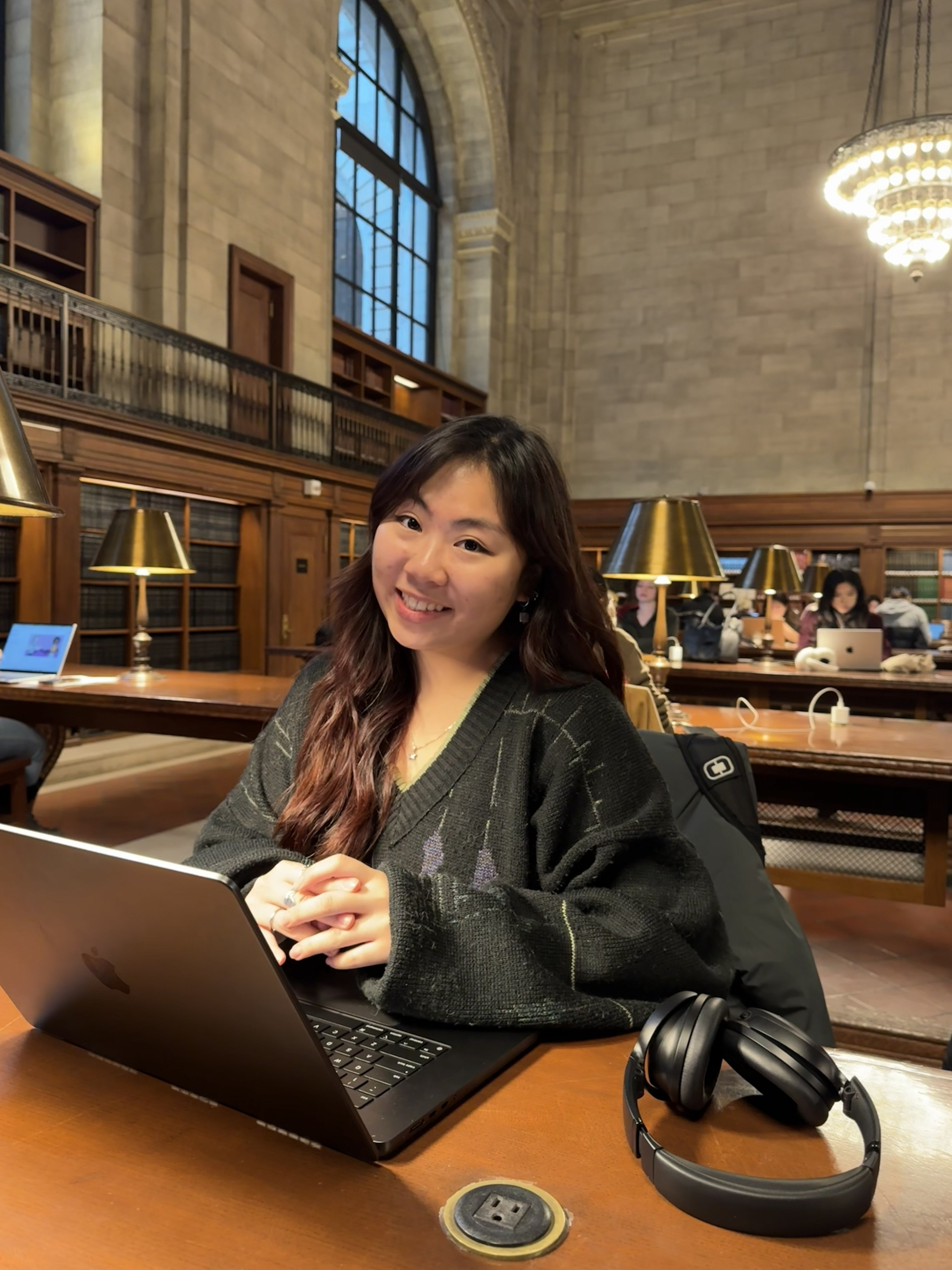 Ealy Fong smiling at a library