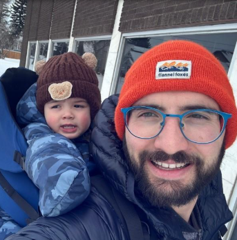 Harrison Sheremeta Smiling with Child