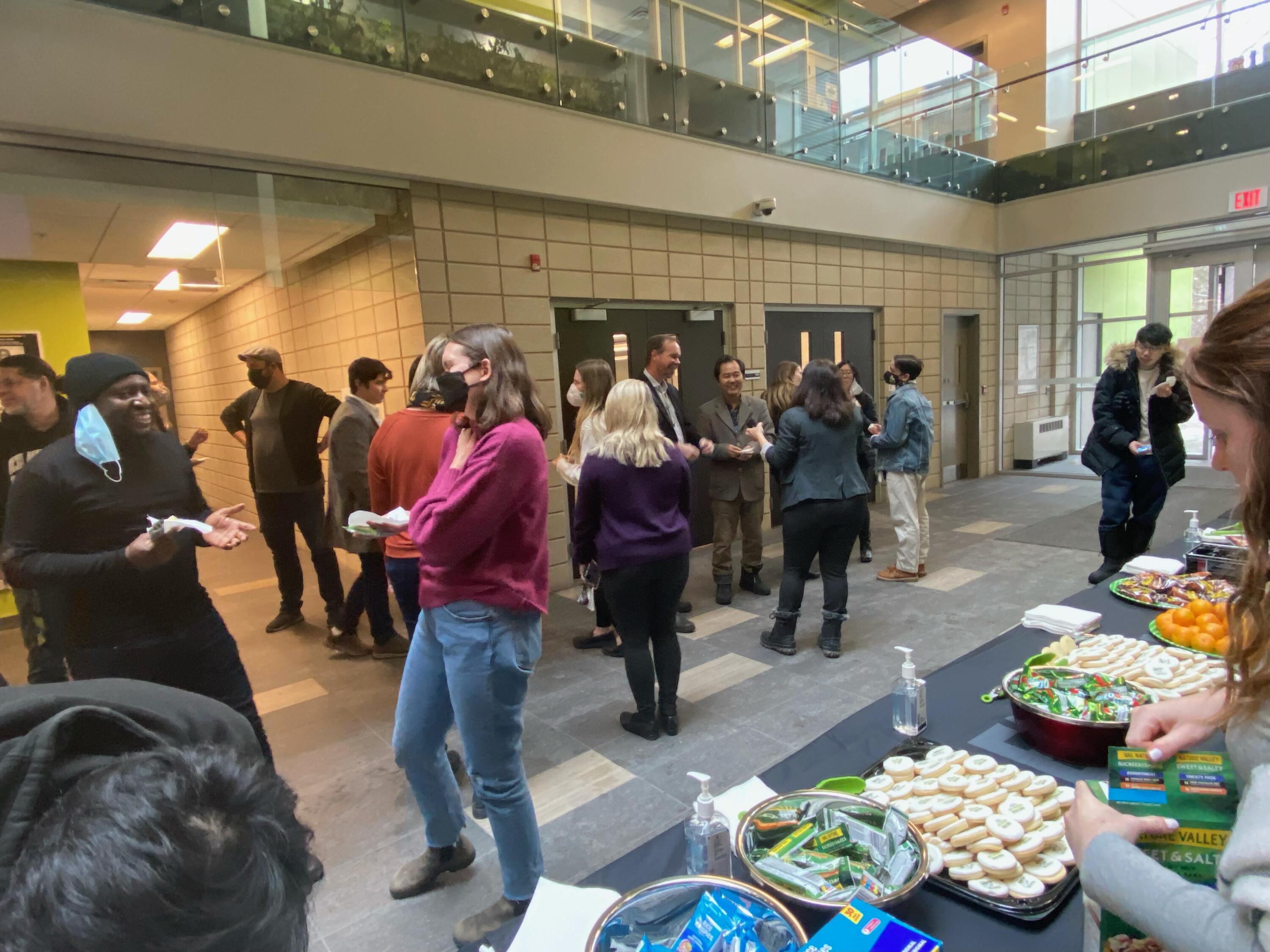 Faculty, students and staff socializing