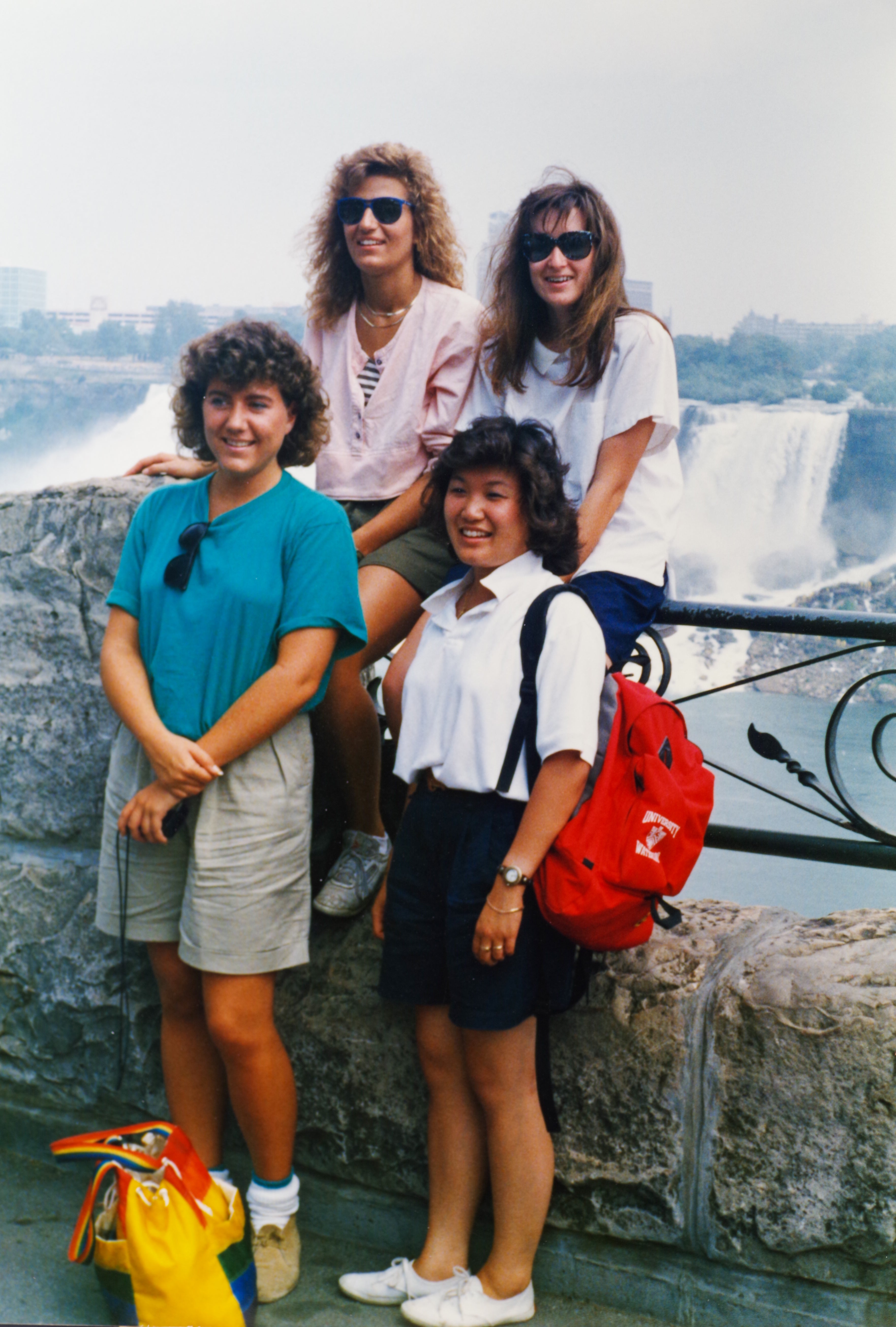 group of woem posing by Niagara falls