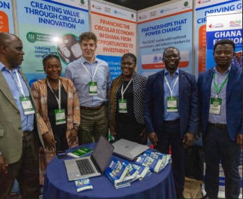 Peter Smalley with team at a conference