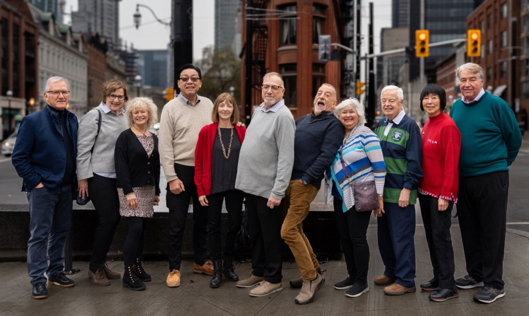 Waterloo Man-Environment class of 1976 group photo on Toronto street in 2023