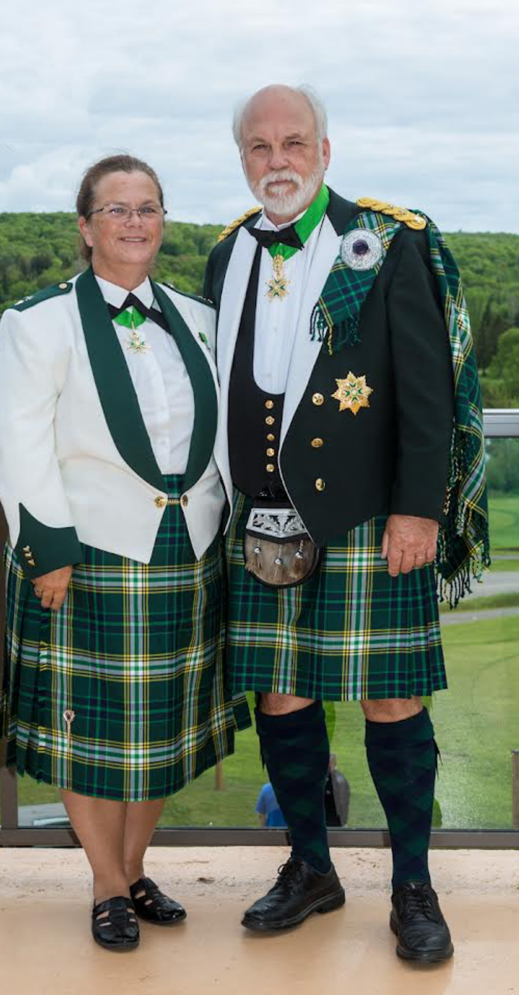 Man and woman in scottish kilts