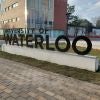 Image of University of Waterloo sign on campus
