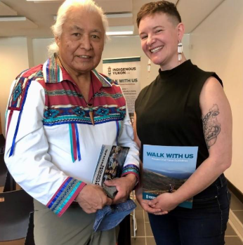 Wren Nicolardi Smiling with another official