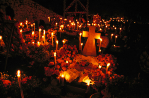 Cemetery lit with candles 