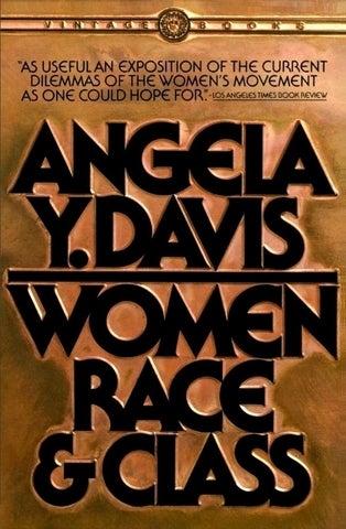 A bookjacket for Women, Race, and Class by Angela Y. Davis with big, bold lettering in black against a gold background.