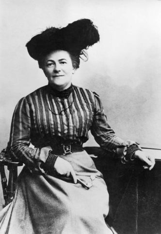 Black and white image of a white woman, Clara Zetkin, seated and facing forward.