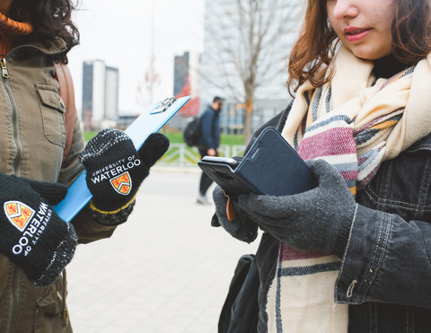 two people using a smartphone