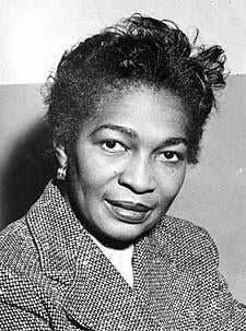 Black and white headshot of Claudia Jones