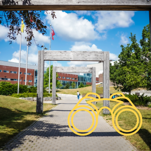 Entrance to the University of Waterloo with a yellow binocular icon.