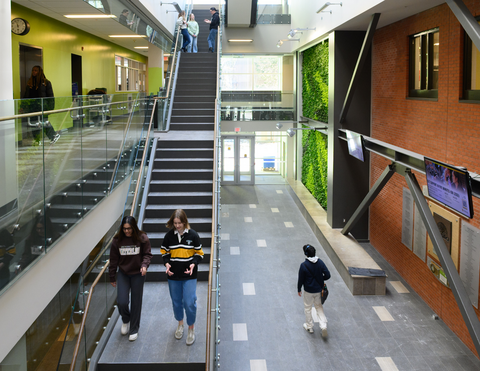 students walking down stairs of EV3