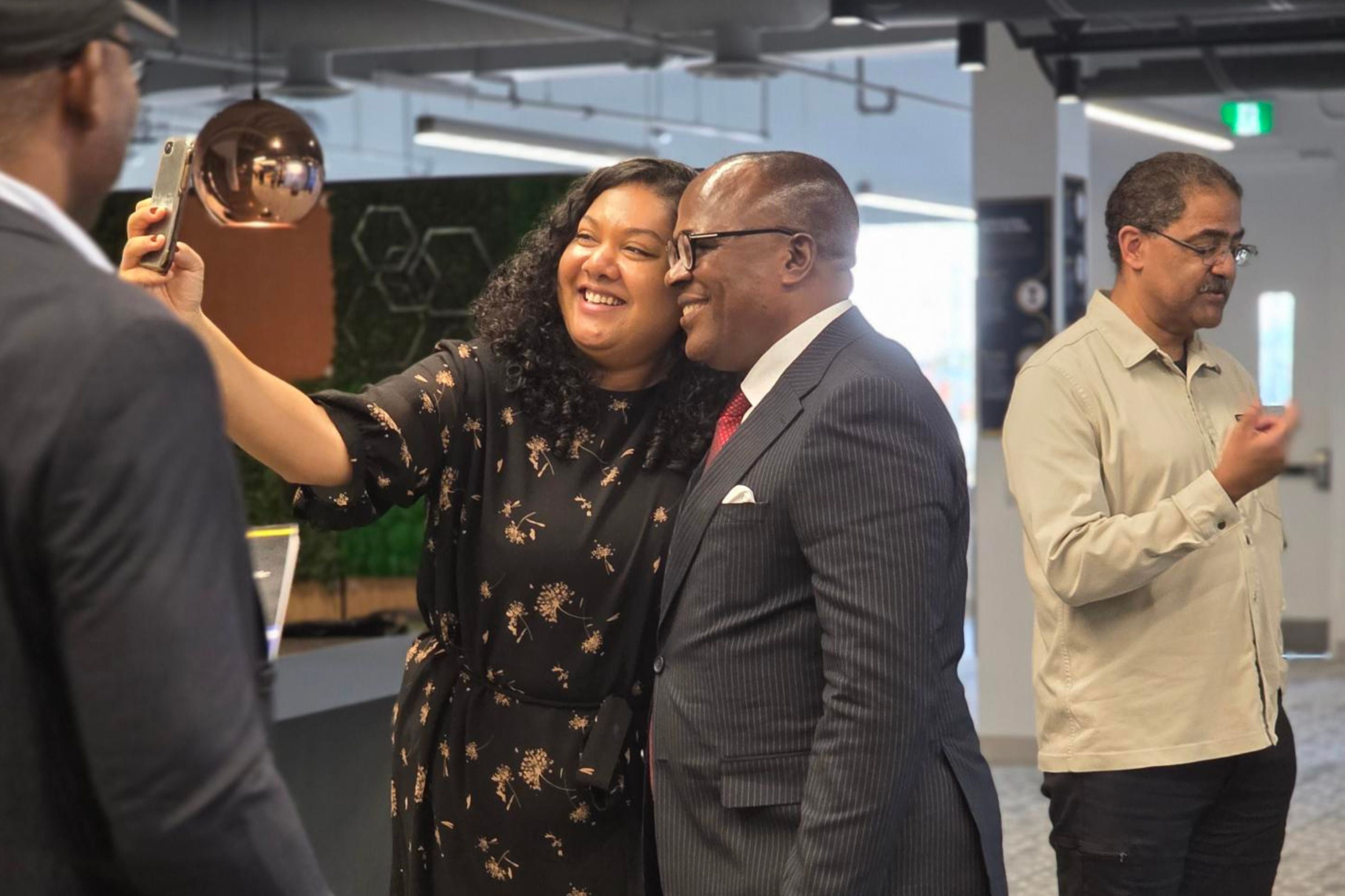 Professor Simon Uchenna Ortuanya with EDIR staff smiling
