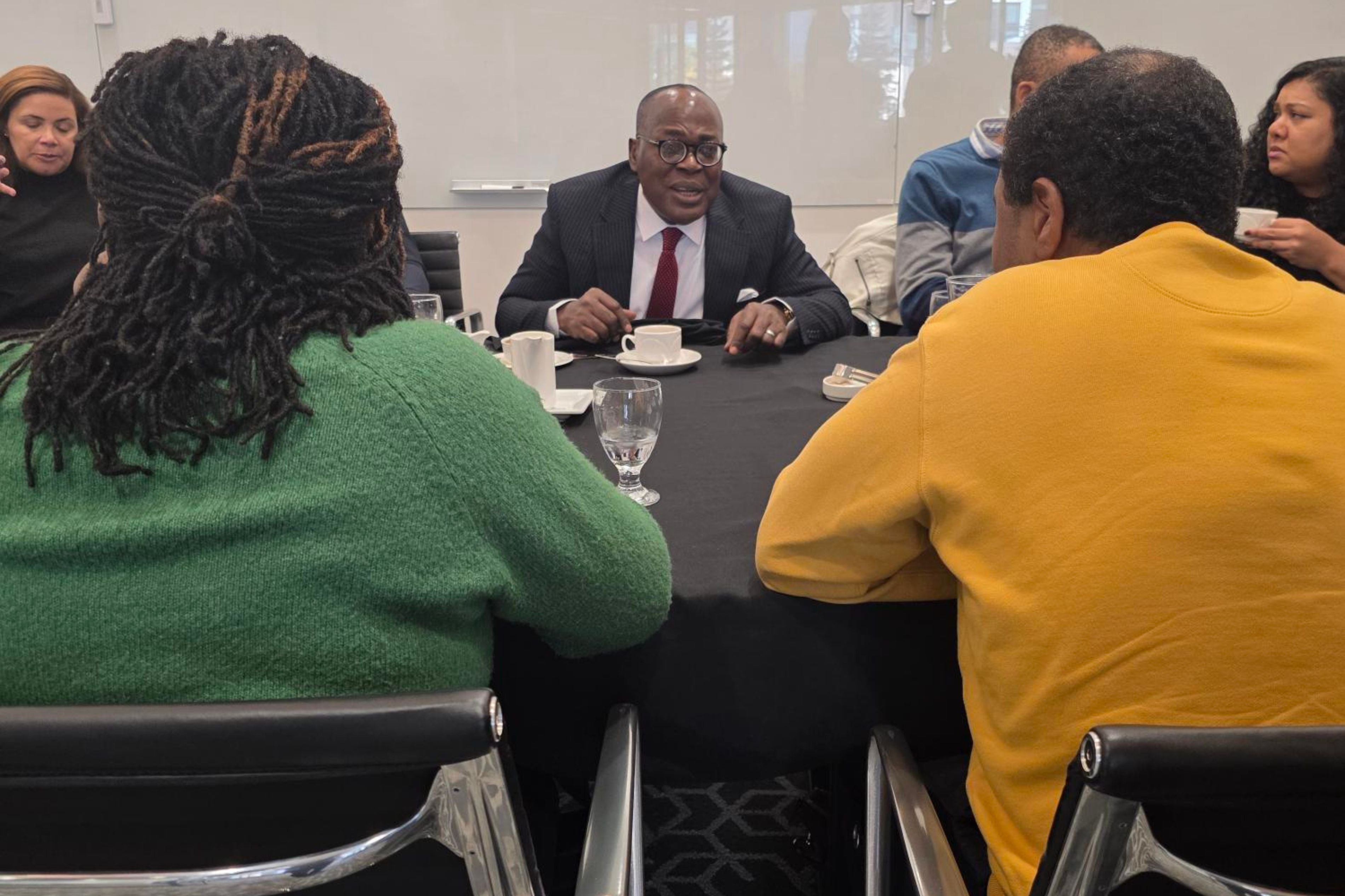 Professor Simon Uchenna Ortuanya speaking to staff