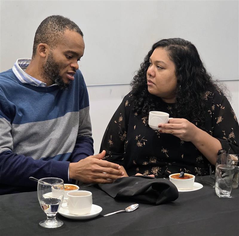 Staff speaking over lunch