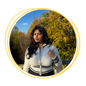 radiyah standing in front of trees