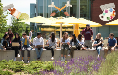 people sitting on a barrier outside on Waterloo campus