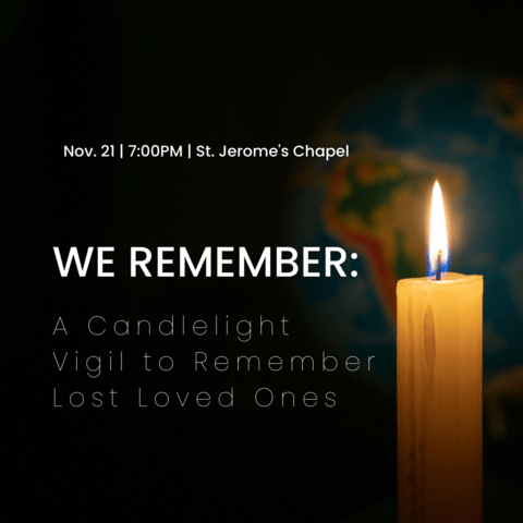 A lit candle with 'we remember' text