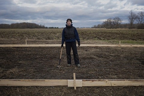 Elise Popa standing in a field