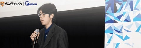 A guy holding a microphone