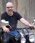 Professor Doug Cowan on a motorcycle