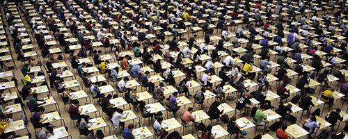 Students writing exams on-campus